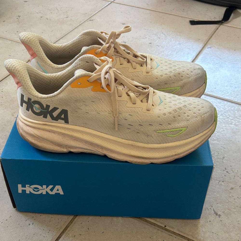 Hoka Sneakers in Cream with Orange and Green Accents